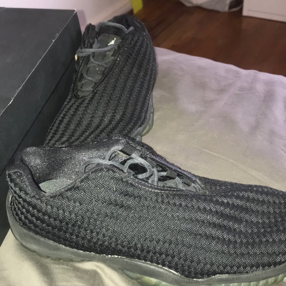 Size 8 future black jordans.